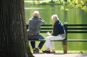 Older couple sitting on a bench